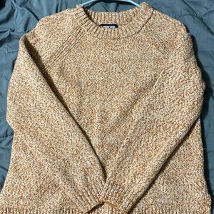 Orange/pink and white sweater